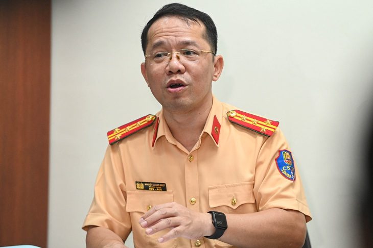 Đại tá Nguyễn Quang Nhật (trưởng phòng Hướng dẫn, tuyên truyền, điều tra giải quyết tai nạn giao thông, Cục Cảnh sát giao thông) - Ảnh: HỒNG QUANG